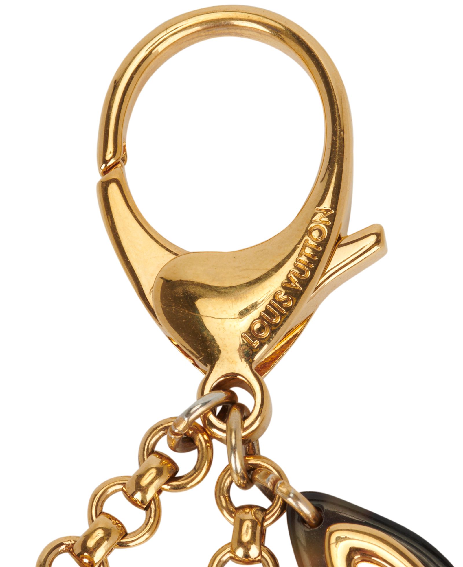 Louis Vuitton Gold Insolence Bag Charm Brown Golden Metal ref.141622 - Joli  Closet