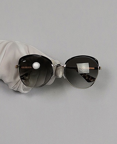 Prada SPR54S Cinema Evolution Sunglasses. Grey Lens, front view