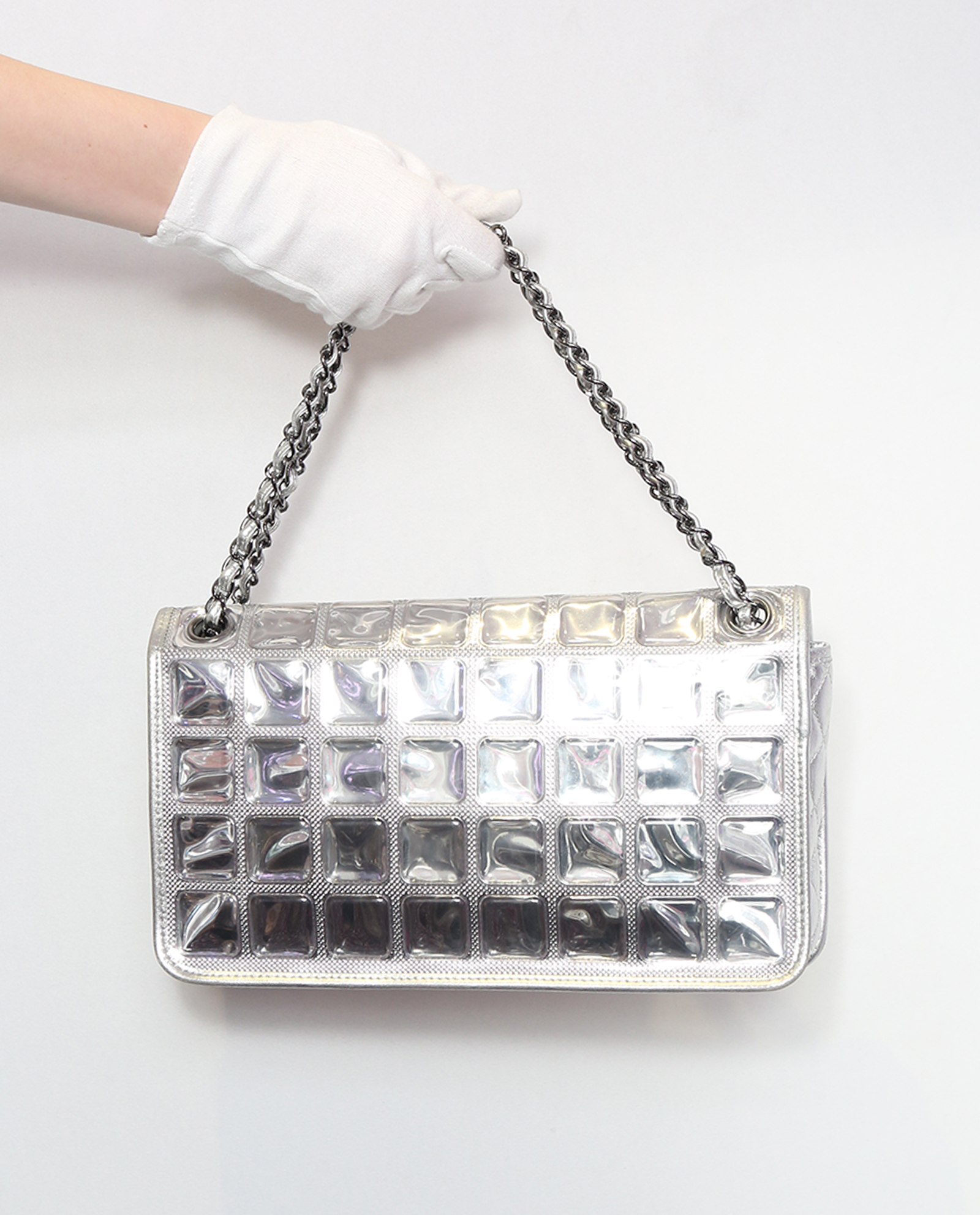 A LIMITED EDITION SILVER PVC AND LEATHER ICE CUBE SINGLE FLAP BAG, CHANEL,  2006-08