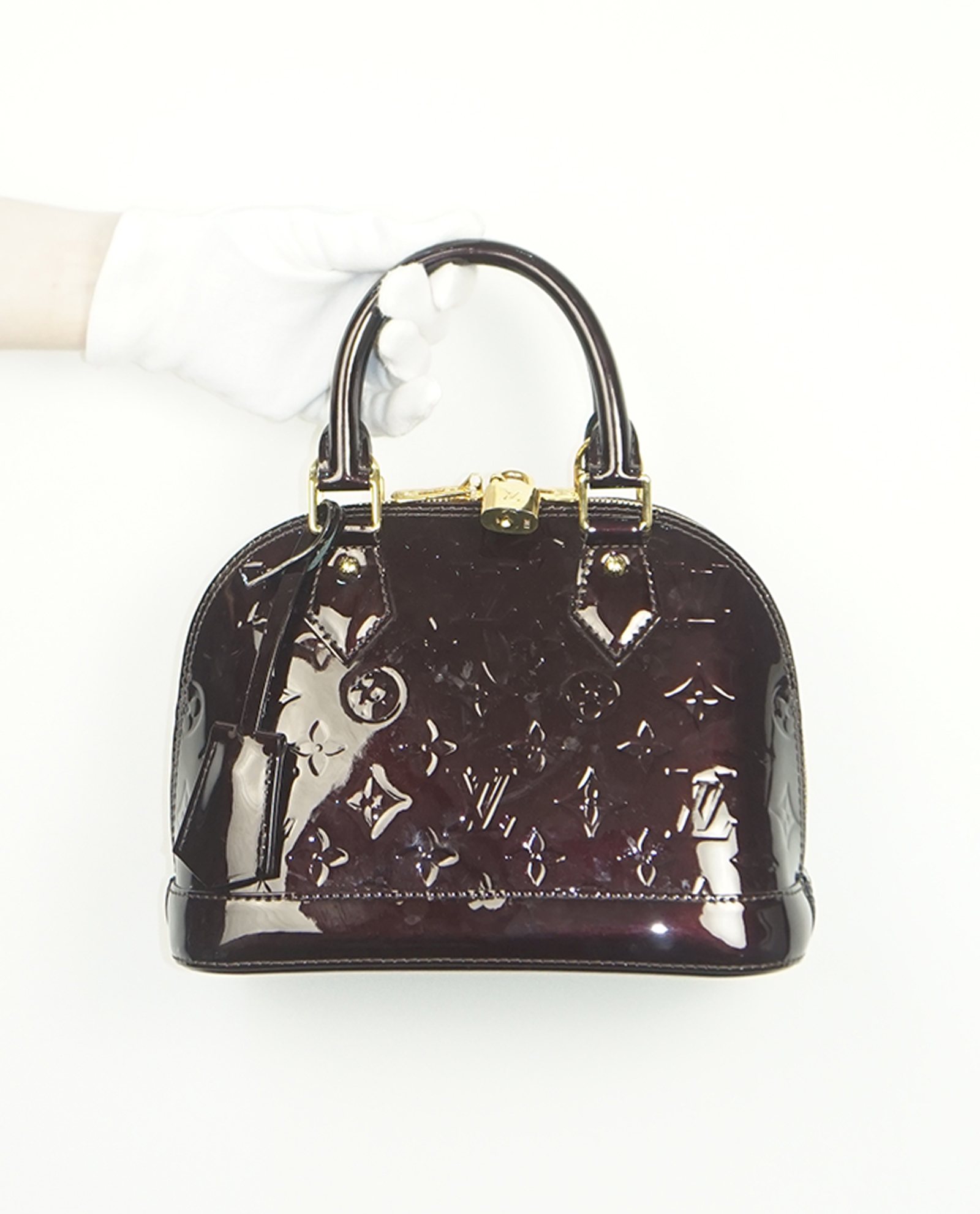 Louis Vuitton Womens Alma Vernis Leather BB Amarante Top Handle Bag