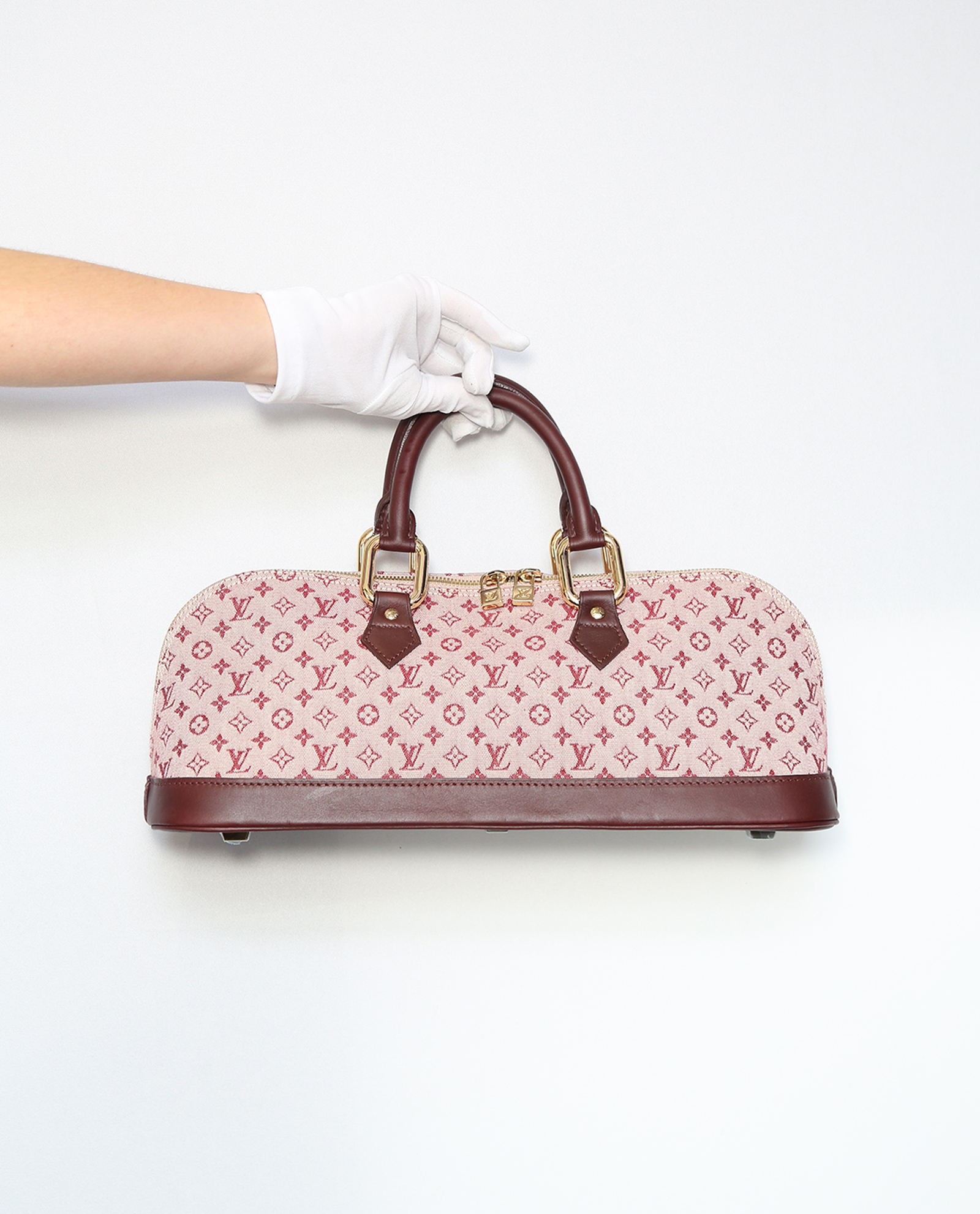 LL Armcandy of the week: Louis Vuitton Alma Mini in red - Luxurylaunches