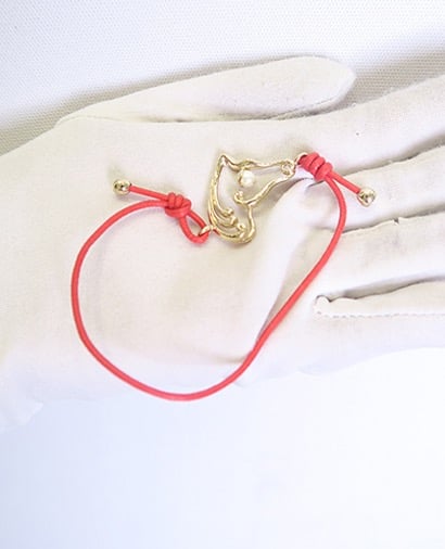 Christian Dior Pearl Wave String Bracelet, front view