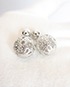 Cannage Mise En Dior Tribal Earrings, front view