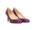 Christian Louboutin Round Toe Pumps, side view